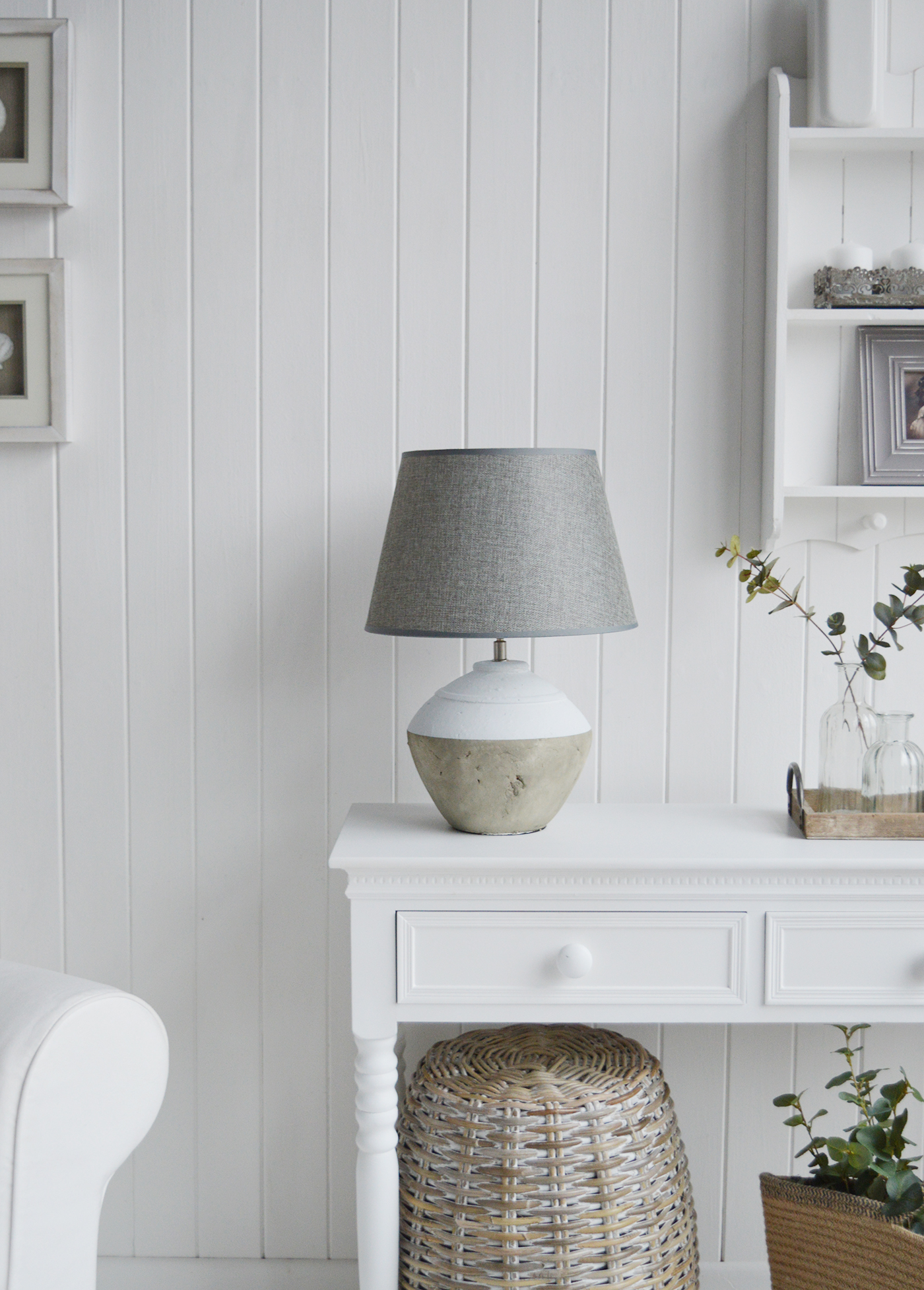 A grey and white stone lamp  from The White Lighthouse Furniture. A lovely table lamp for bedside table or living room or bedroom furniture. New England style table lamps
