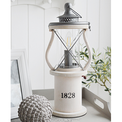 The Lewiston is a charming Victorian white wooden lantern table coastal lamp.Perfect vintage styling for a New England styled home in the living room, hallway or bedroom.