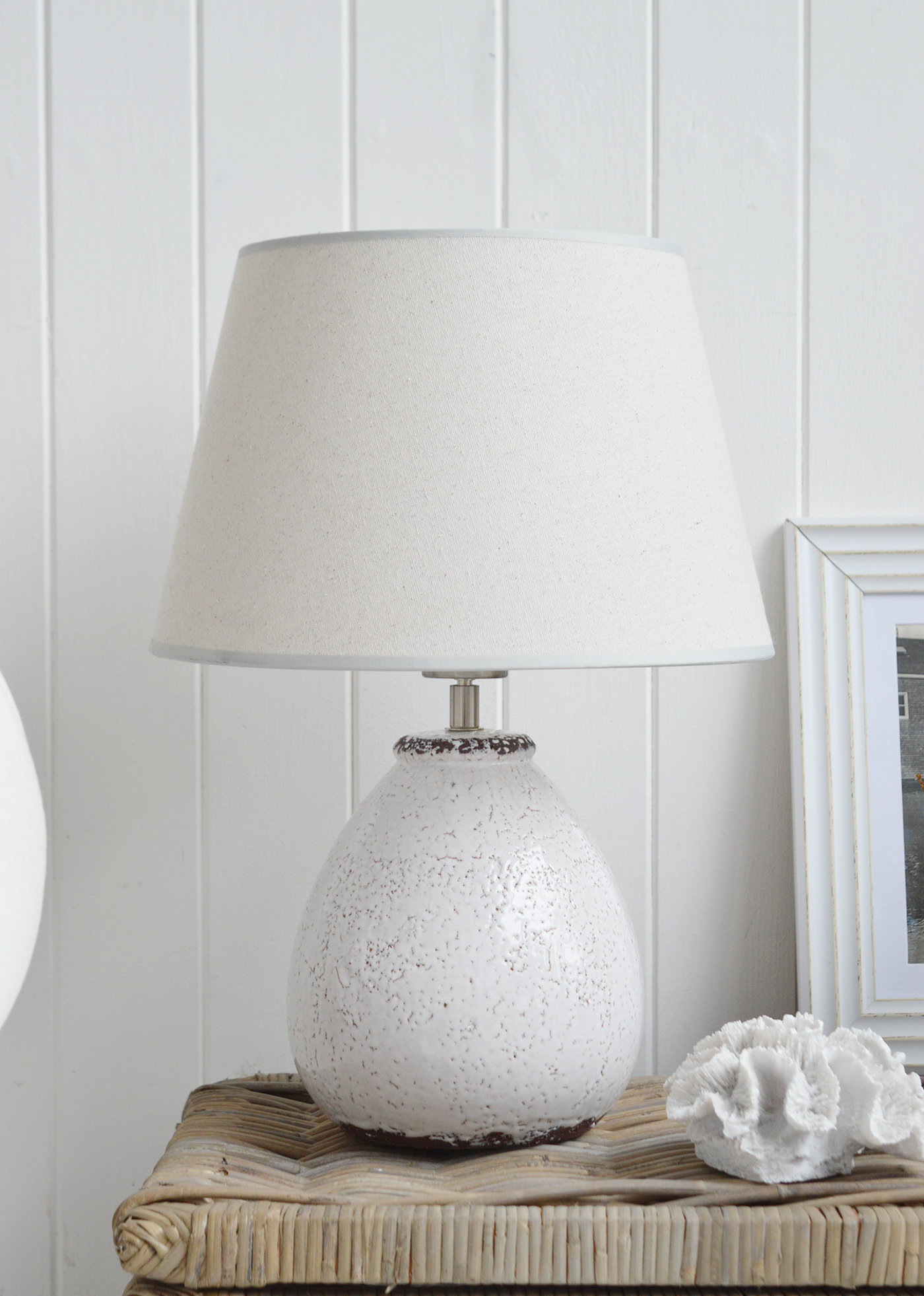 The Sanford white ceramic lmap , ideal in a coastal New England styled beach house or modern farmhouse