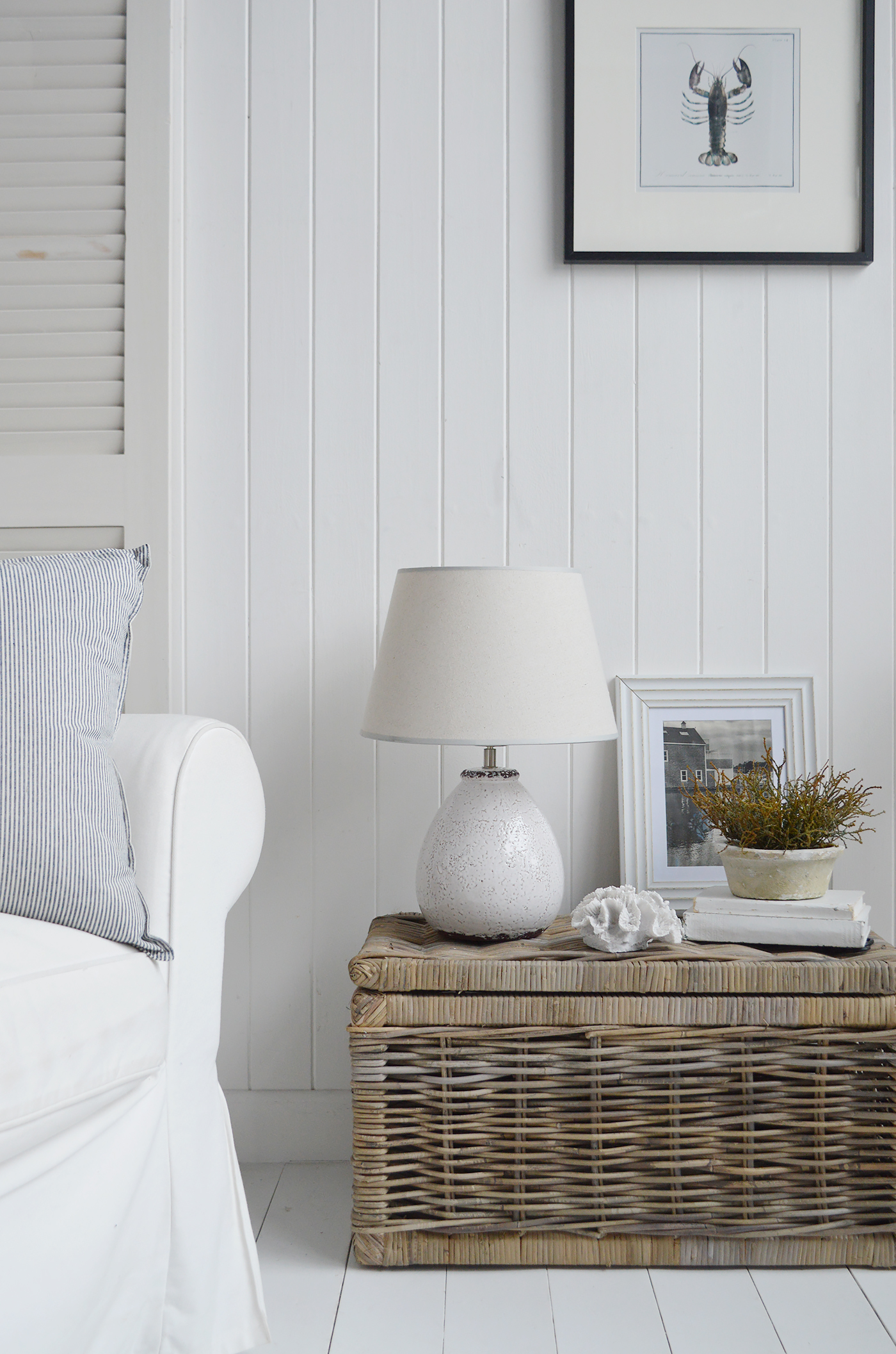 The Sanford white ceramic lmap , ideal in a coastal New England styled beach house or modern farmhouse