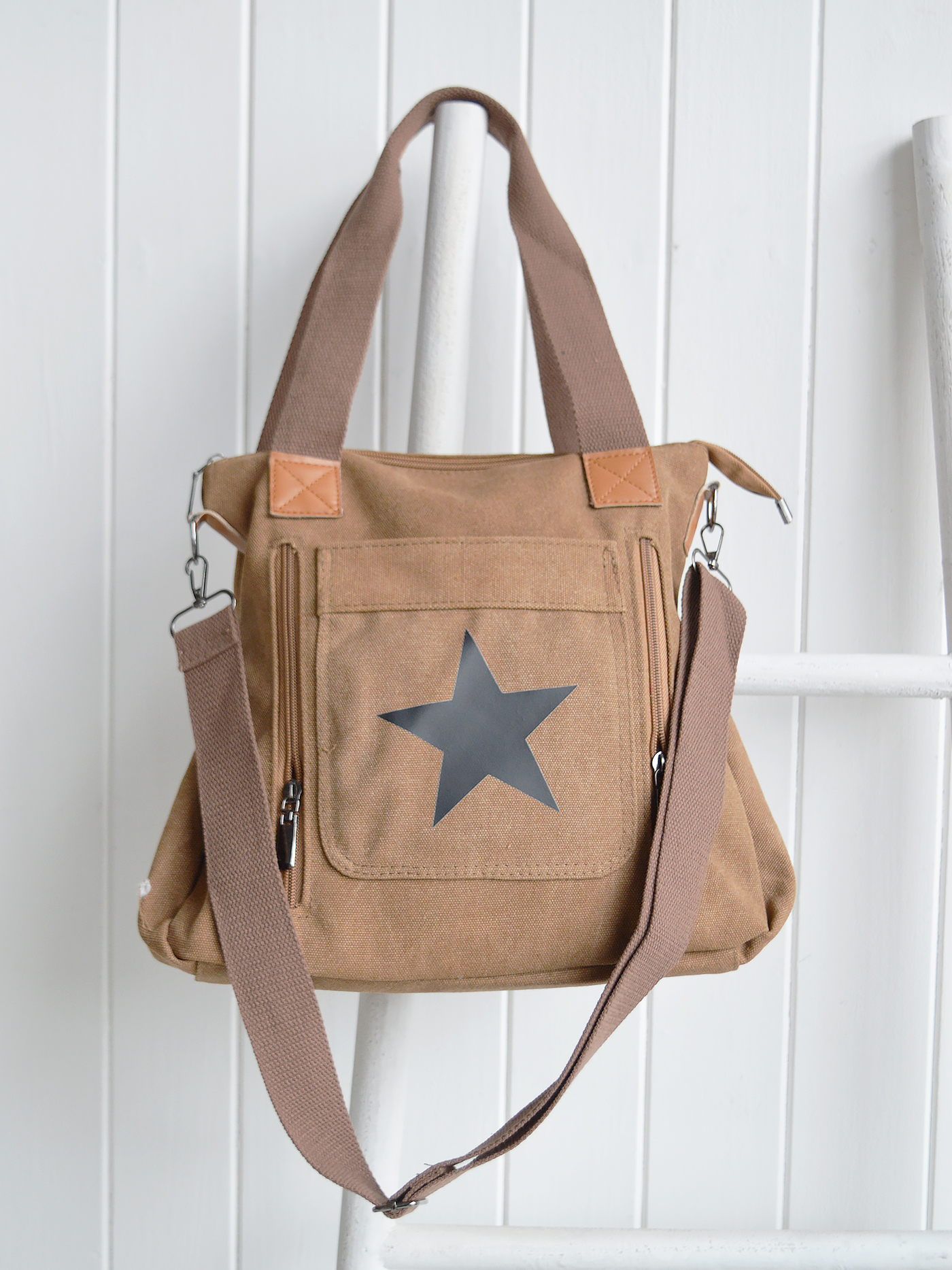 Our White Lighthouse Lifestyle Bags are crafted from durable canvas with a relaxed star detail, combining everyday practicality with effortless style.