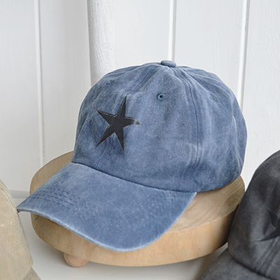 The Washed Blue Star Cap captures the tone of faded seaside skies, offering an effortless New England feel for everyday coastal living.