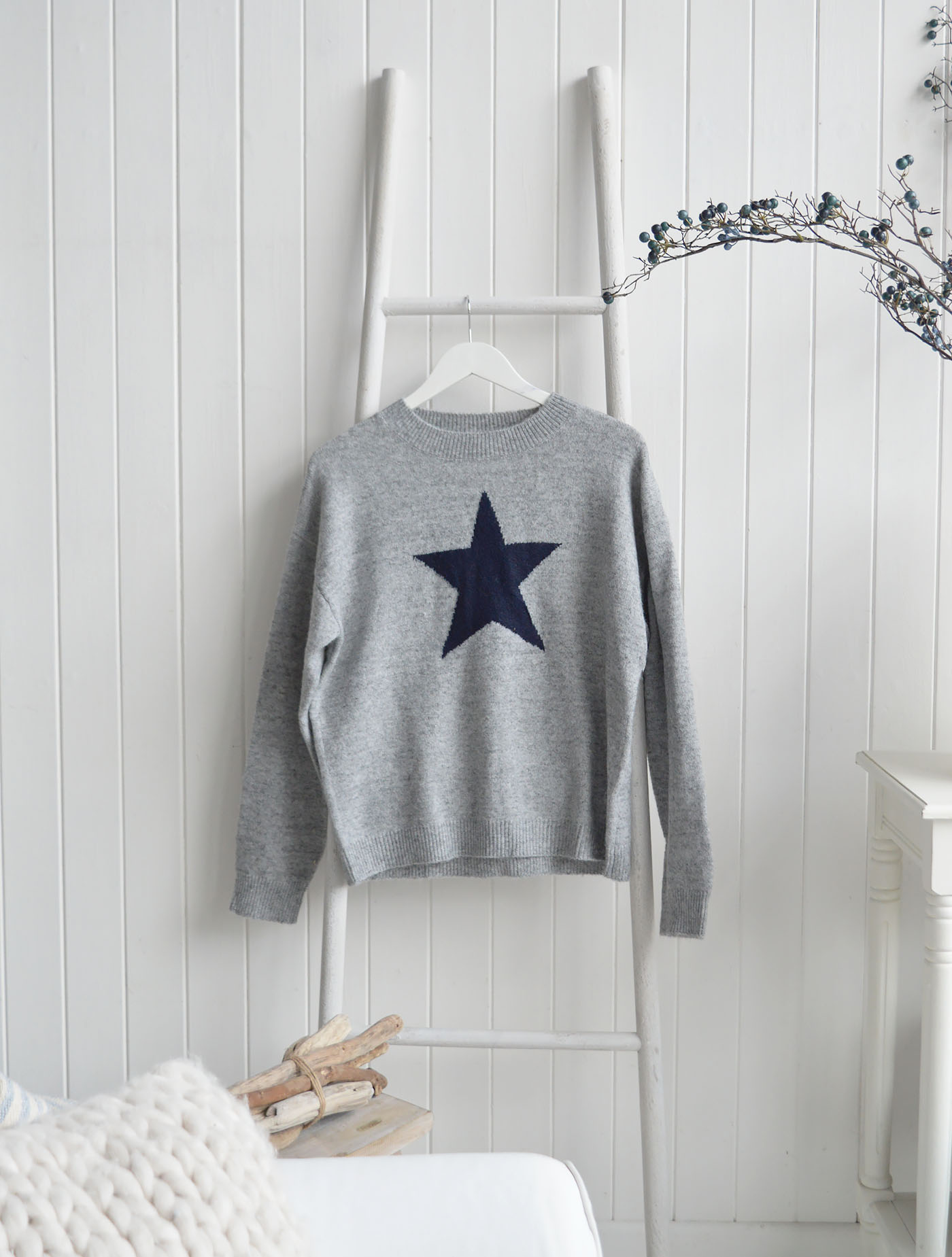 Bring a relaxed New England feel into your everyday wardrobe with our White Lighthouse Star Knit Jumper