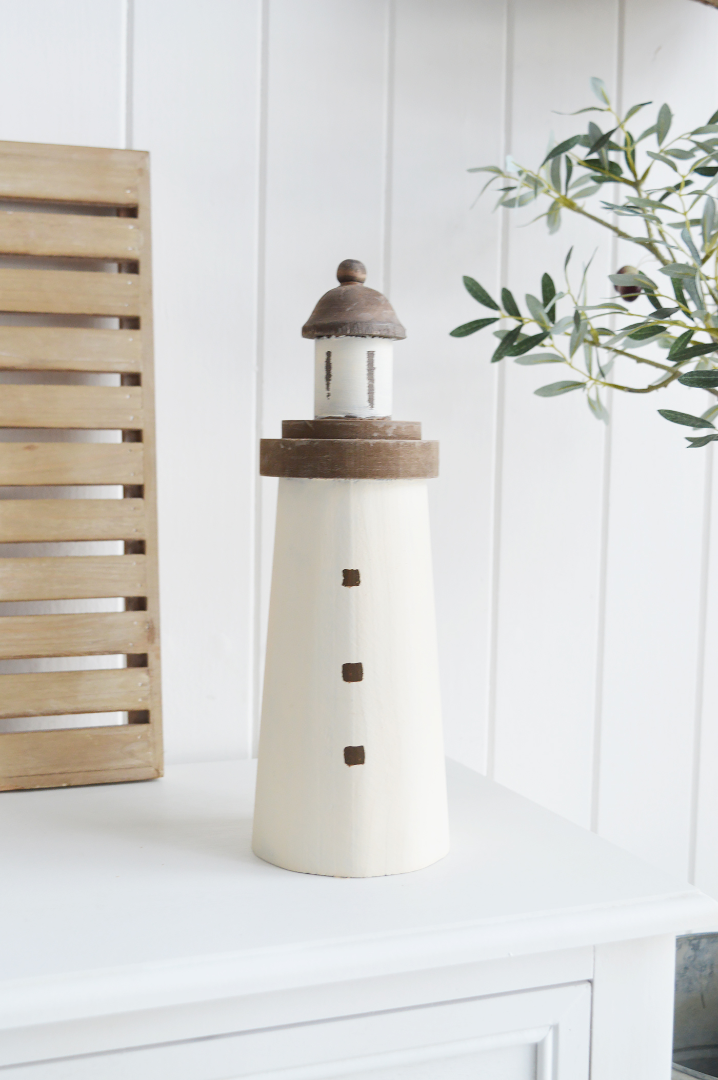 Distressed wooden lighthouse for coastal interiors
