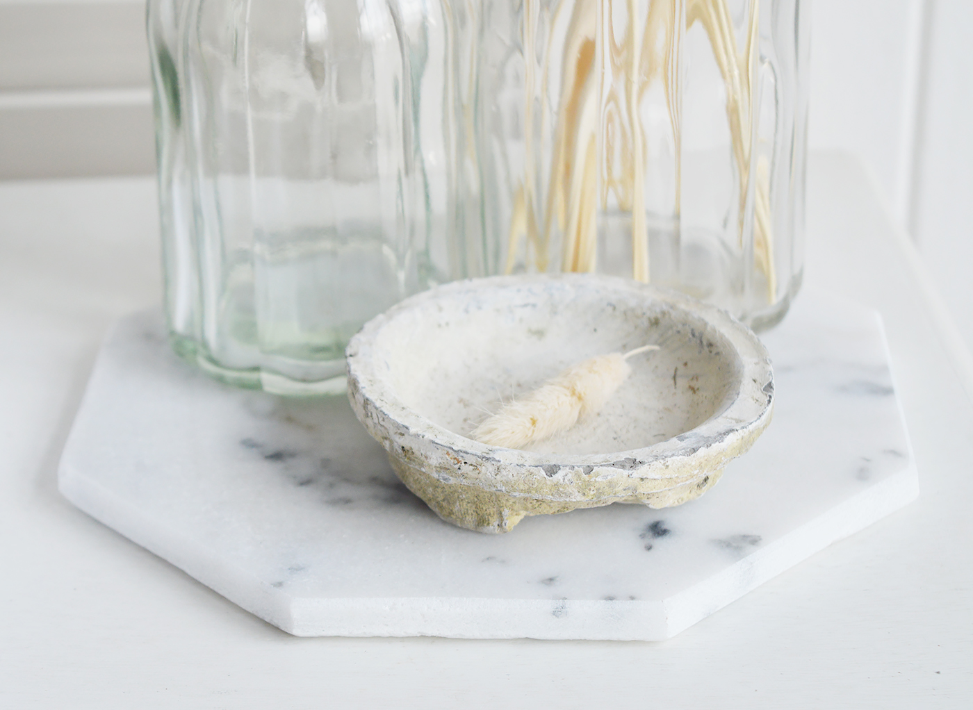 A white marble tray from The White Lighthouse furniture and accessories. New England style interiors for coastal, country, city and farmhouse styled homes