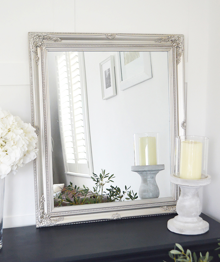 Silver wall mirror. Over mantel, dressing table or hall
