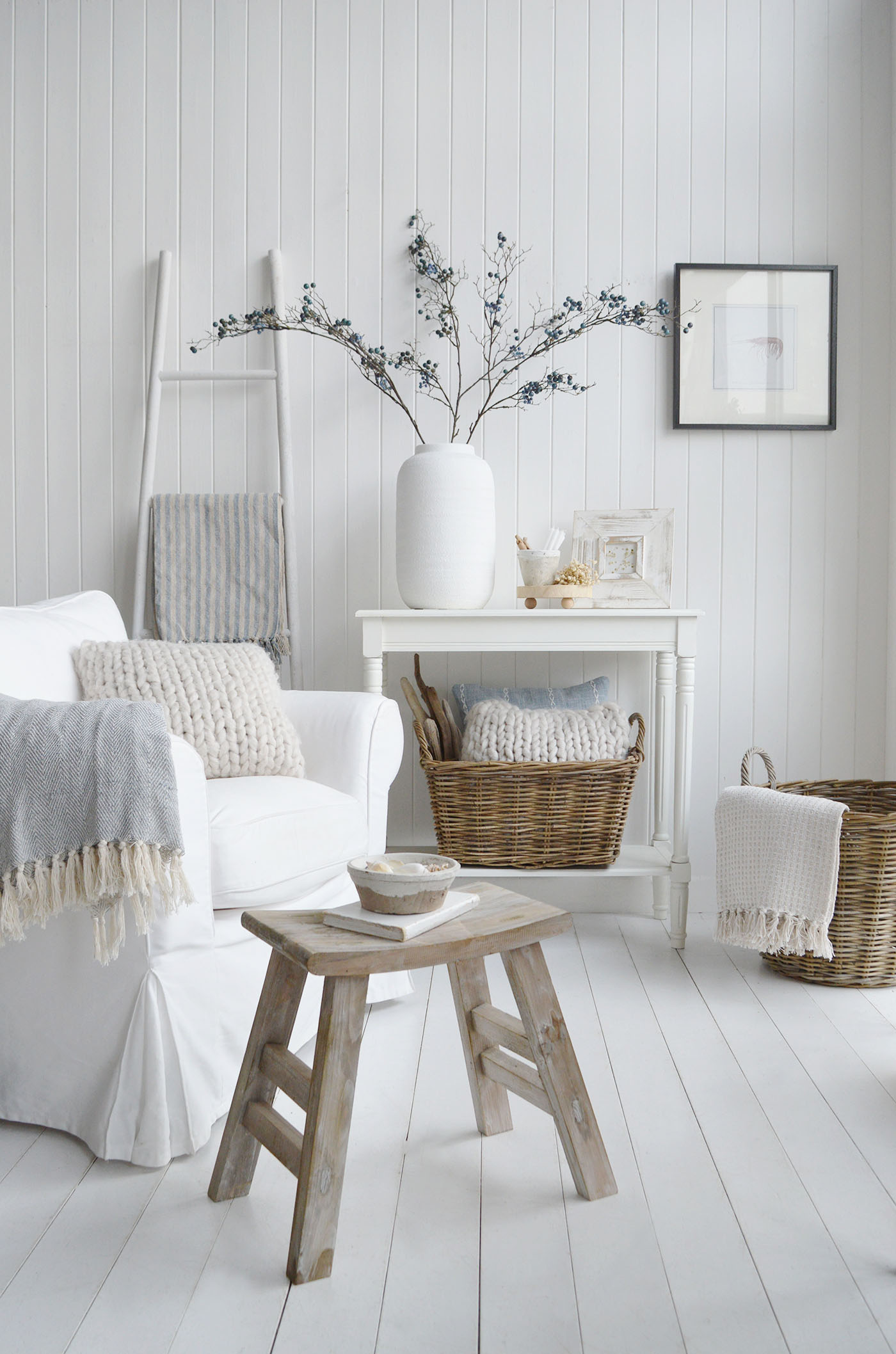 Create an effortless beach house feel with faux blueberry branches, adding subtle coastal colour and organic detail to light, airy rooms and neutral home decor.