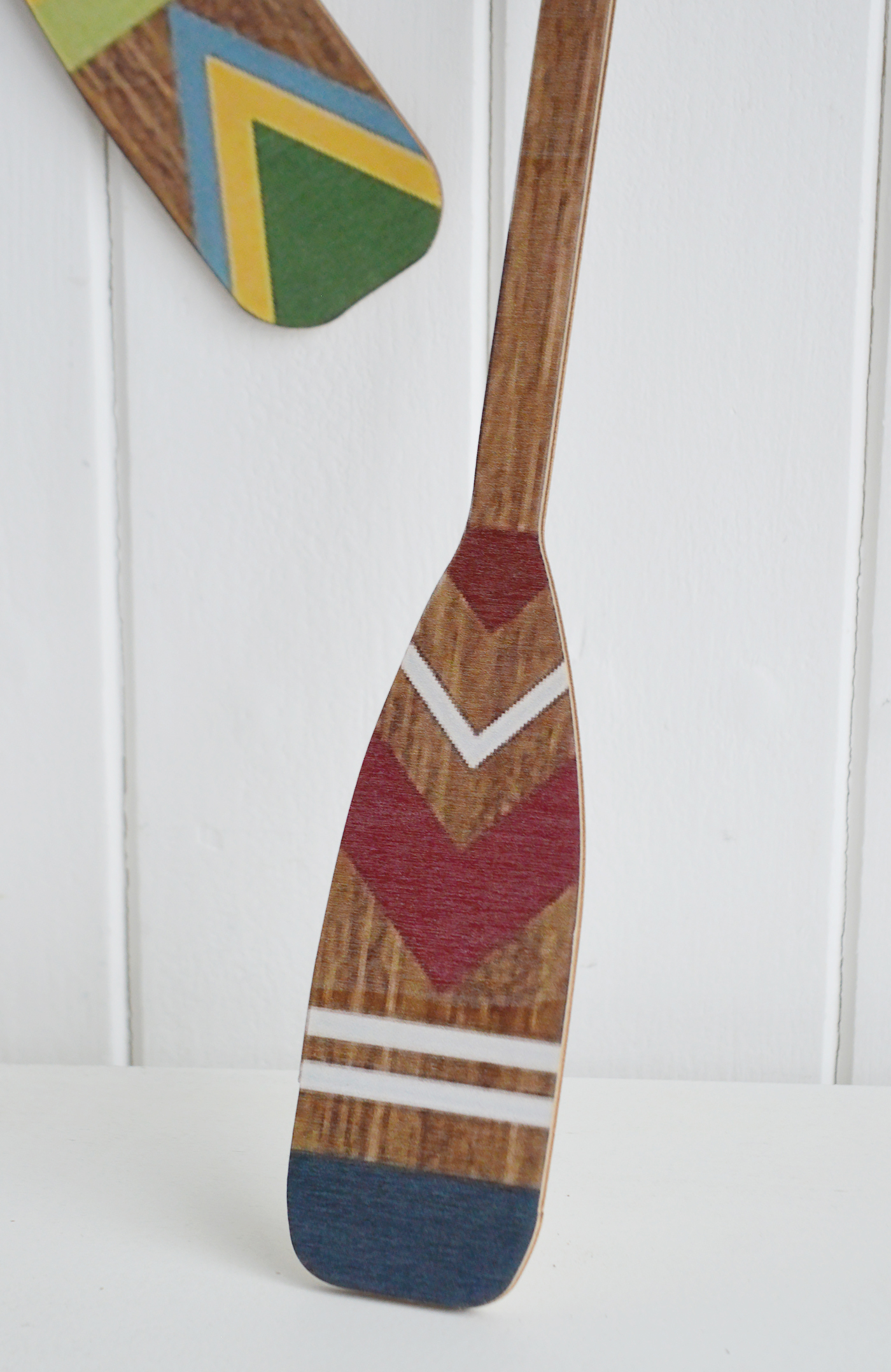 This set of four decorative paddles is an effortless way to introduce coastal decor to hallways, living rooms, bathrooms or holiday homes.