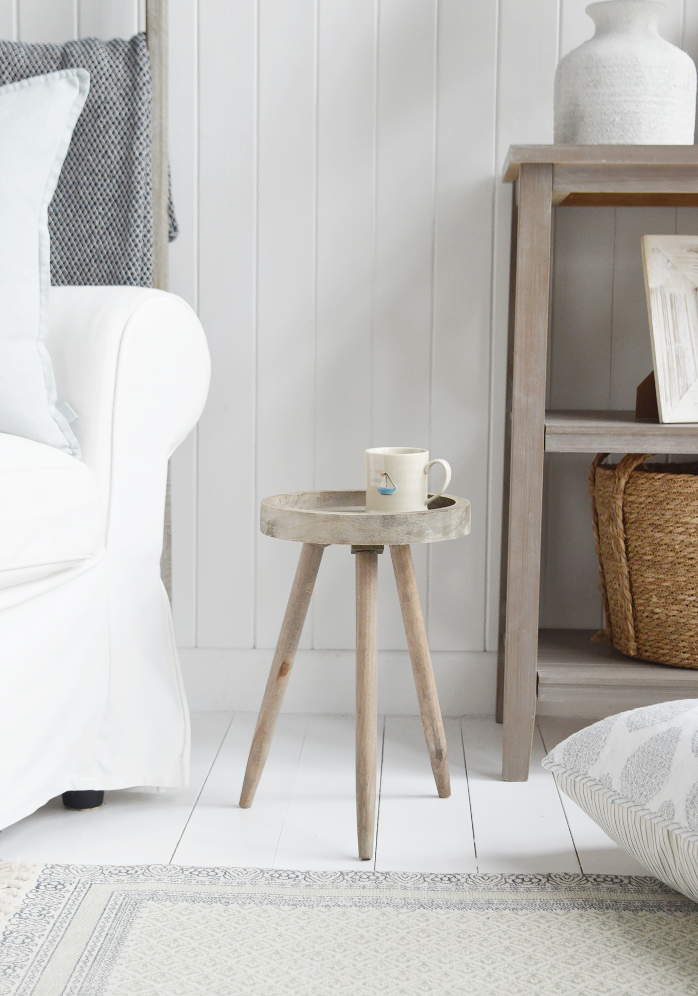 Rustic wooden round milking stool table for New England homes and interiors to dercorate coastal, country and modern farmhouse styled homes