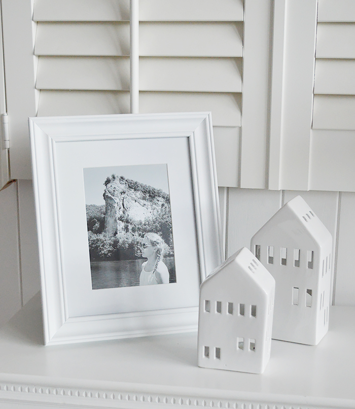White simple wooden photoframe 5 x 7 and 6 x 4 photographs