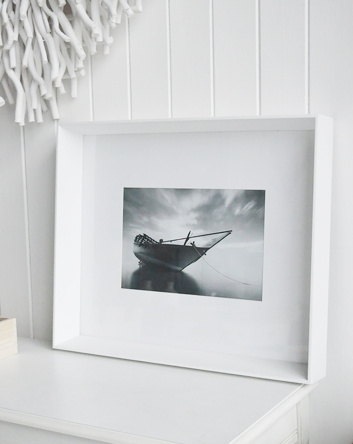 A white large box wooden photo frame for 12 x 8 photographs - wall hung or standing. White Furniture and accessories for the home. New England Coastal and Country for the hallway, living room, bedroom and bathroom from The White Lighthouse Furniture to sit on a shelf or table top