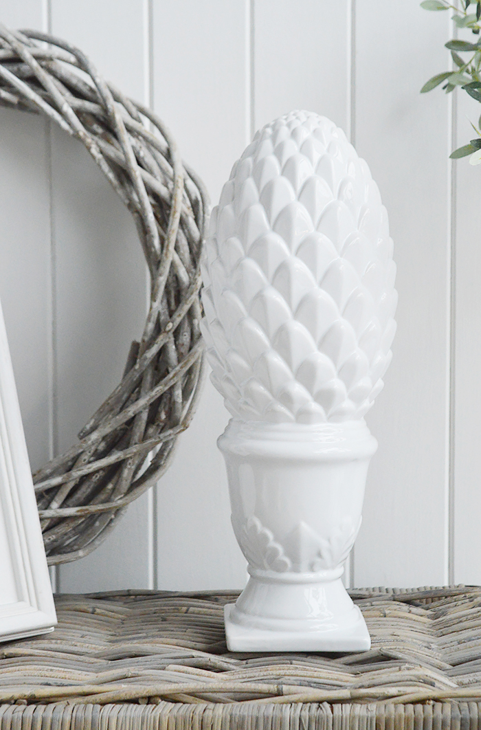 Decorative white standing pine cone