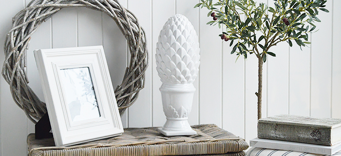 Decorative white standing pine cone
