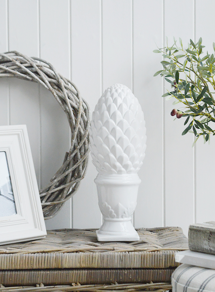 Decorative white standing pine cone