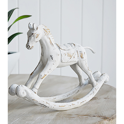 Decorative white wooden rocking horse