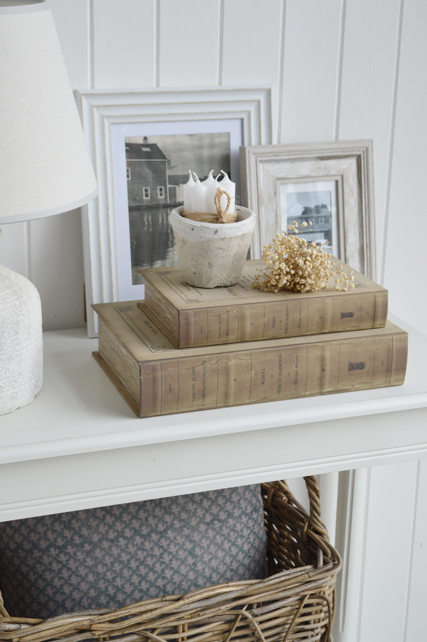 Perfect for storing keepsakes, remotes or small items, these storage books combine charm, practicality and effortless New England appeal.