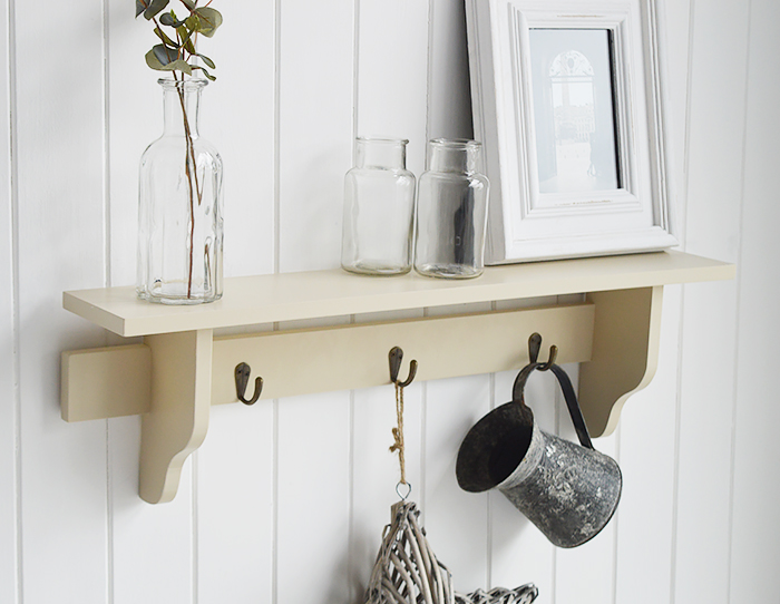 Springfield cream wooden wall shelf with hooks from The White Lighthouse. White Furniture and accessories for the bedroom, bathroom, hall and living room in coastal, New England and country homes and interiors. width=