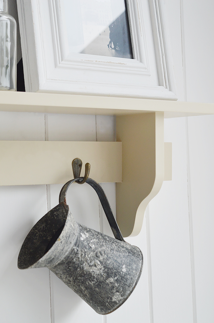 Springfield cream wooden wall shelf with hooks from The White Lighthouse. White Furniture and accessories for the bedroom, bathroom, hall and living room in coastal, New England and country homes and interiors. width=