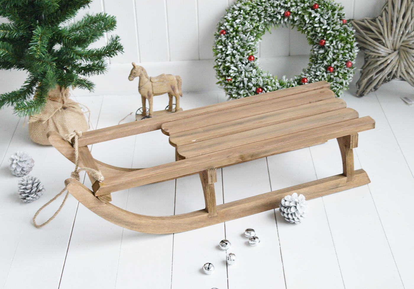 A gorgeous decorative wooden sleigh for elegant Christmas decorations. An absolutely beautiful festive decoration in such a timeless style that will last for many years to come, creating many magical memories from The White Lighthouse Furniture in New England , Country Coastal and City home interiors and furniture