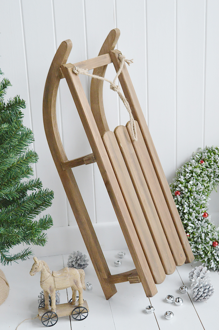 A gorgeous decorative wooden sleigh for elegant Christmas decorations. An absolutely beautiful festive decoration in such a timeless style that will last for many years to come, creating many magical memories from The White Lighthouse Furniture in New England , Country Coastal and City home interiors and furniture