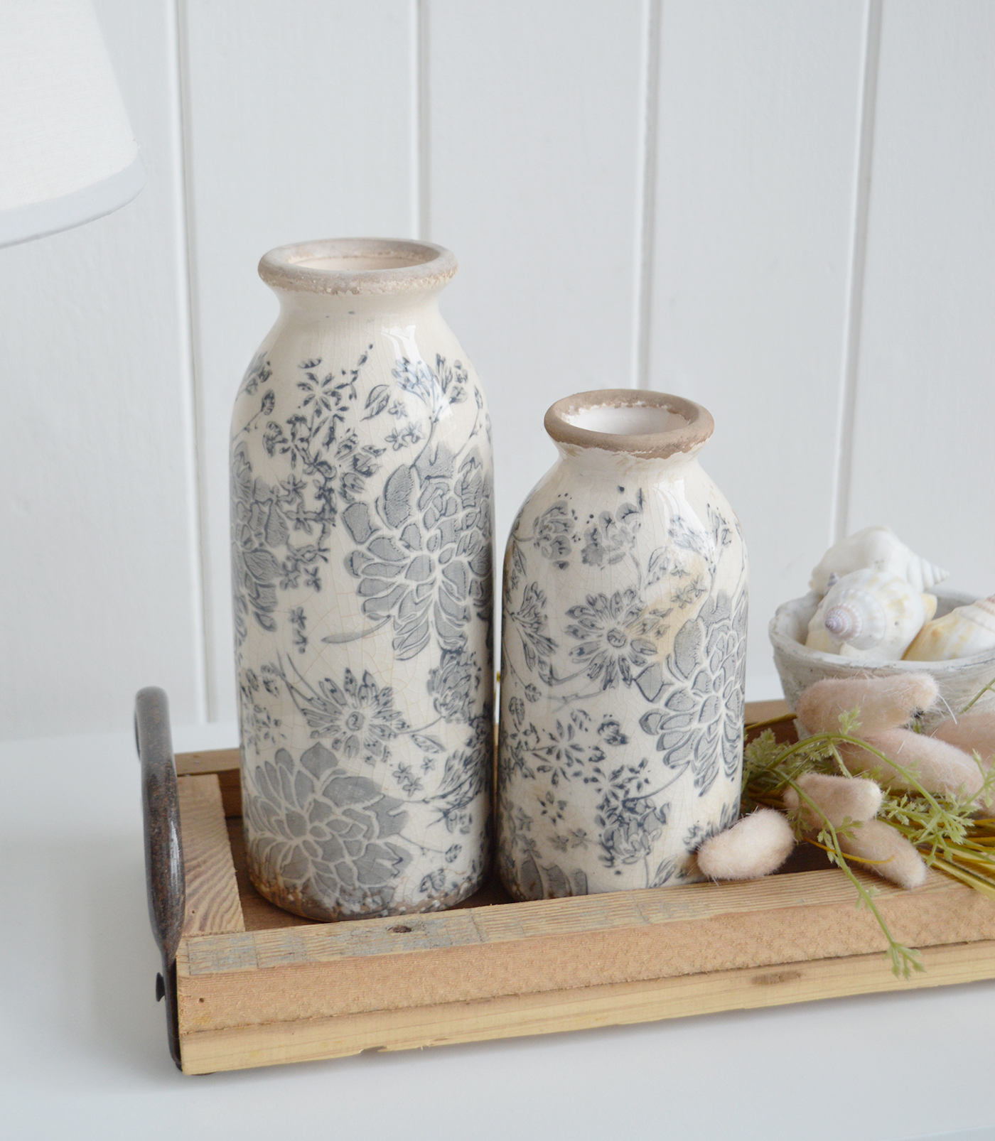 A wooden styling tray brings natural warmth to coffee tables and consoles in New England and country cottage interiors.