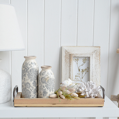 Shop the Coastal Meadow Styling Bundle with floral vases, decorative shells, faux coral and a wooden tray for coastal cottage and New England interiors.