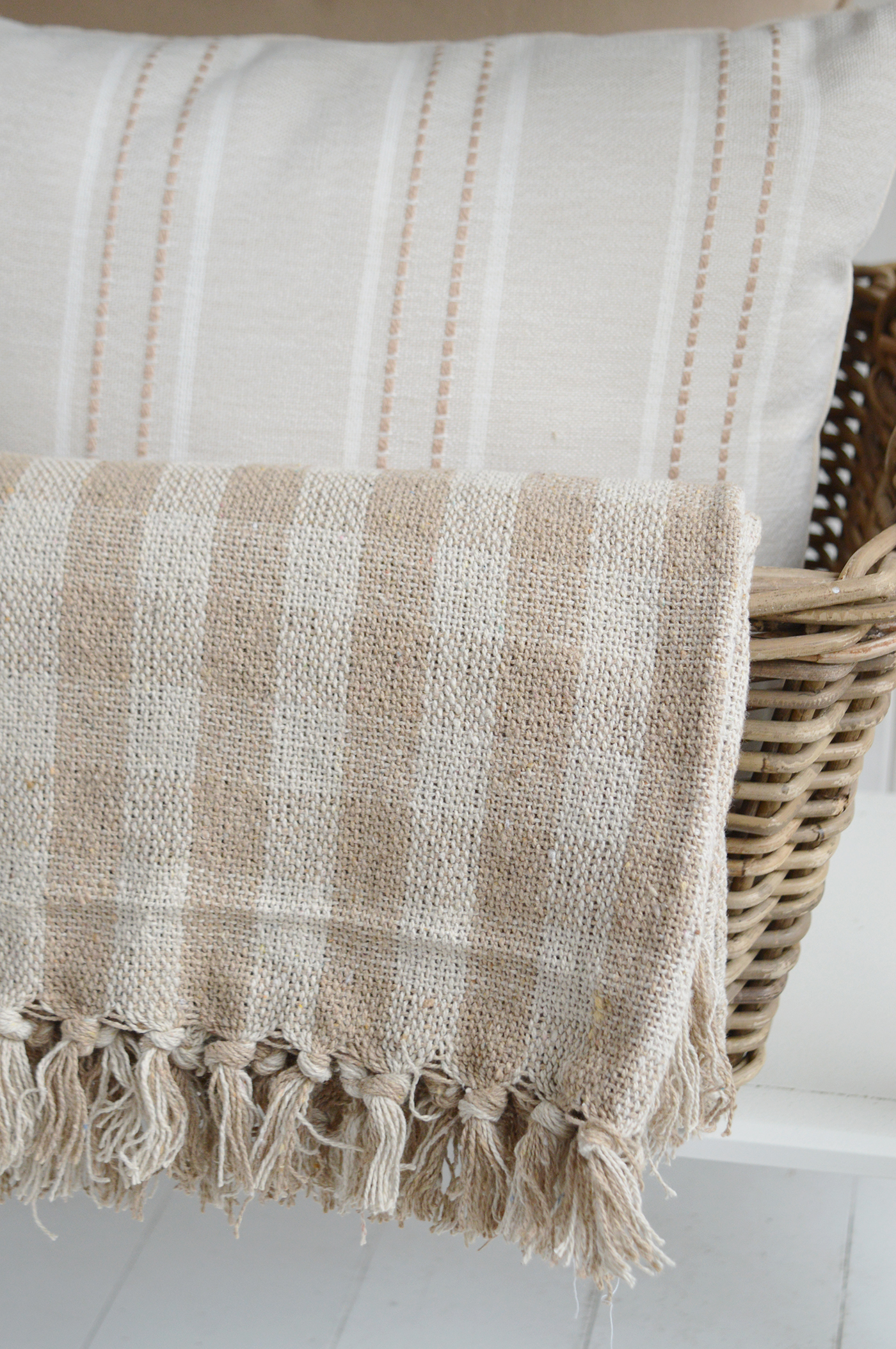 The Stowe Sand Check Throw is a beautiful finishing touch for beach house interiors, adding texture, comfort and timeless neutral styling.