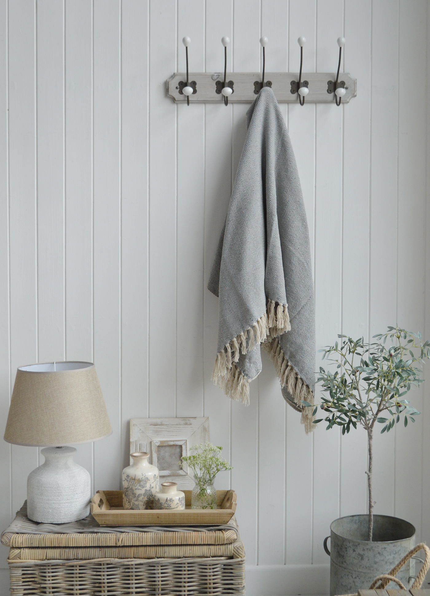 Stowe throws in blues, greys and natural coloures  for interiors in New England styles modern farmhouse, country, coastal and city homes from The White Lighthouse. Furniture and home interiors UK - Pale Grey Herringbone Throw