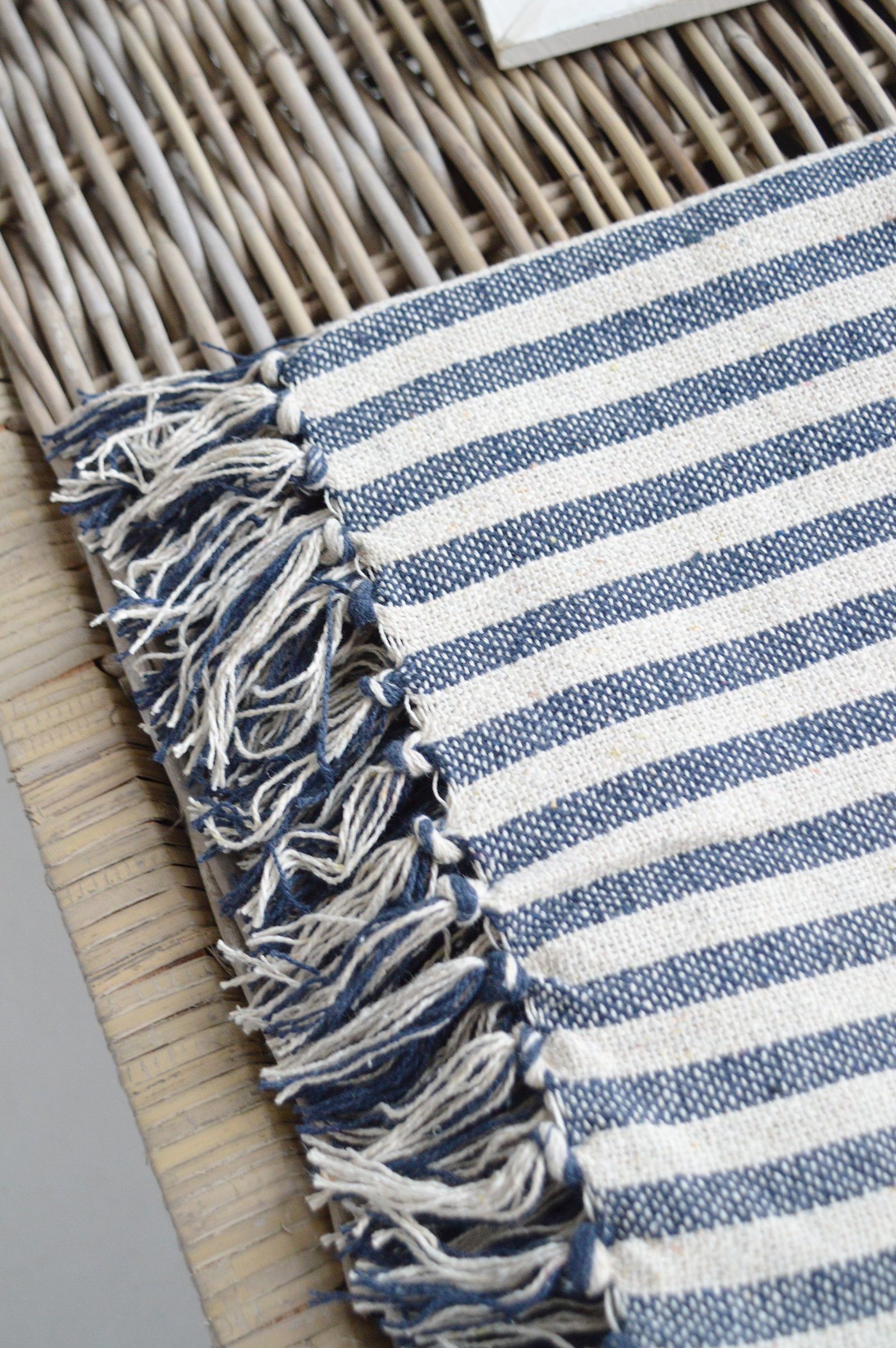 Coastal, country and modern farmhouse interiors and furniture. Navy Blue Mapleton Stripe throws for cosy homes and interiors