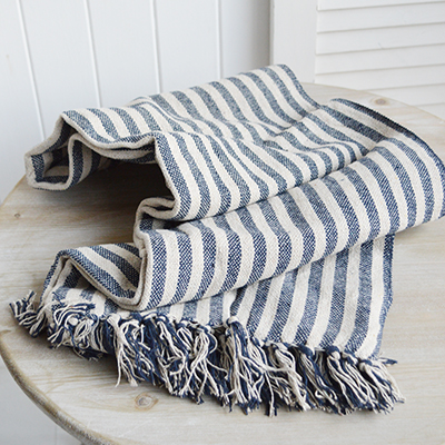 Coastal, country and modern farmhouse interiors and furniture. Navy Blue Mapleton Stripe throws for cosy homes and interiors