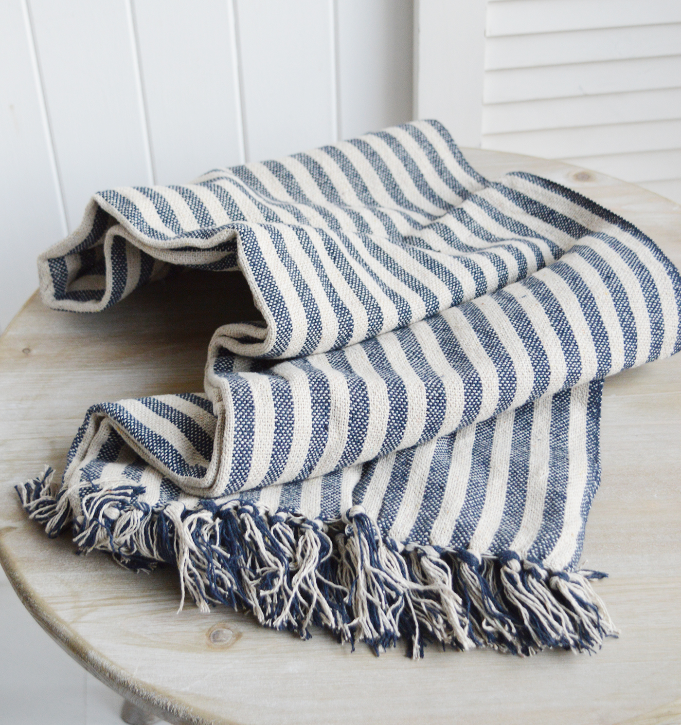 Coastal, country and modern farmhouse interiors and furniture. Navy Blue Mapleton Stripe throws for cosy homes and interiors