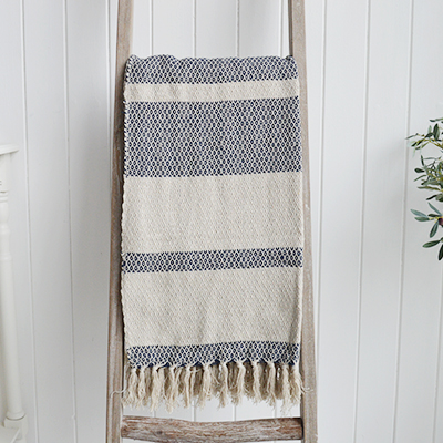 Stowe throws in blues, greys and natural coloures  for interiors in New England styles modern farmhouse, country, coastal and city homes from The White Lighthouse. Furniture and home interiors UK - Navy and Herringbone Throw