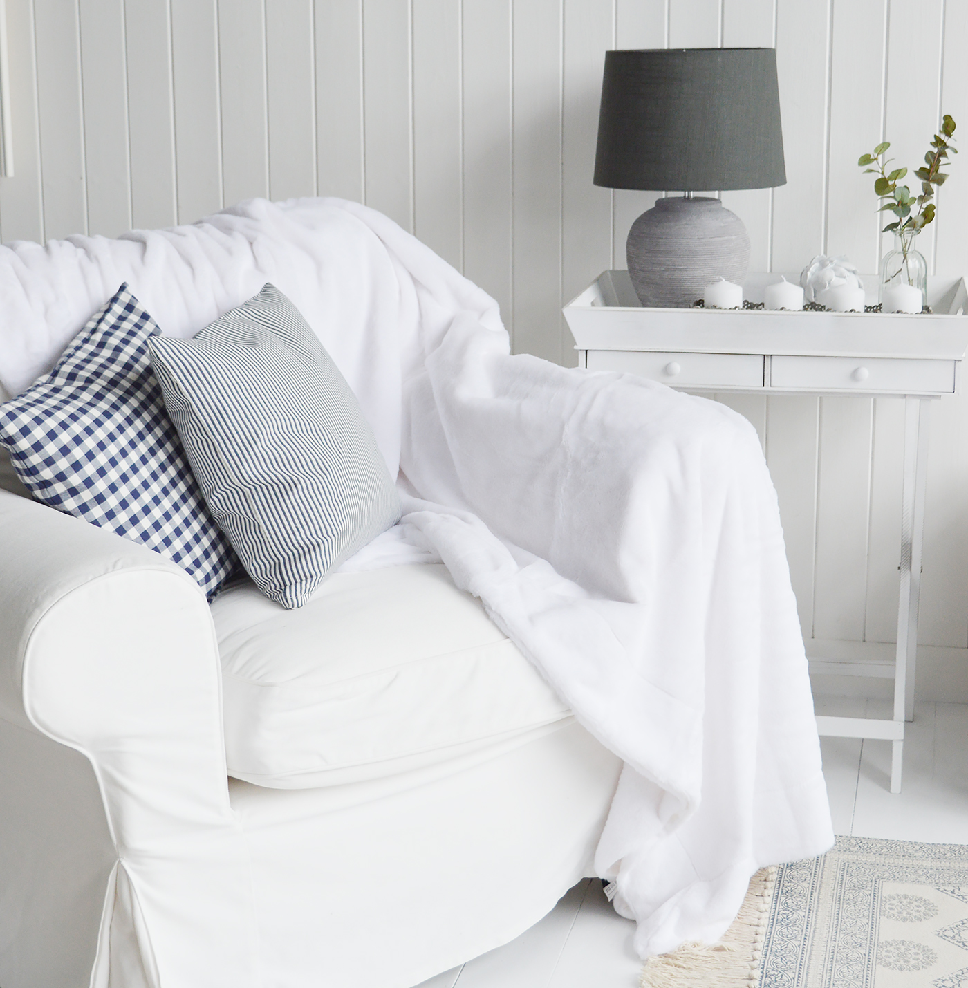 New England home interiors. Stowe cosy furry large throw from The White LIghthouse Furniture. Coastal, country, farmhouse and city home furnishings and furniture