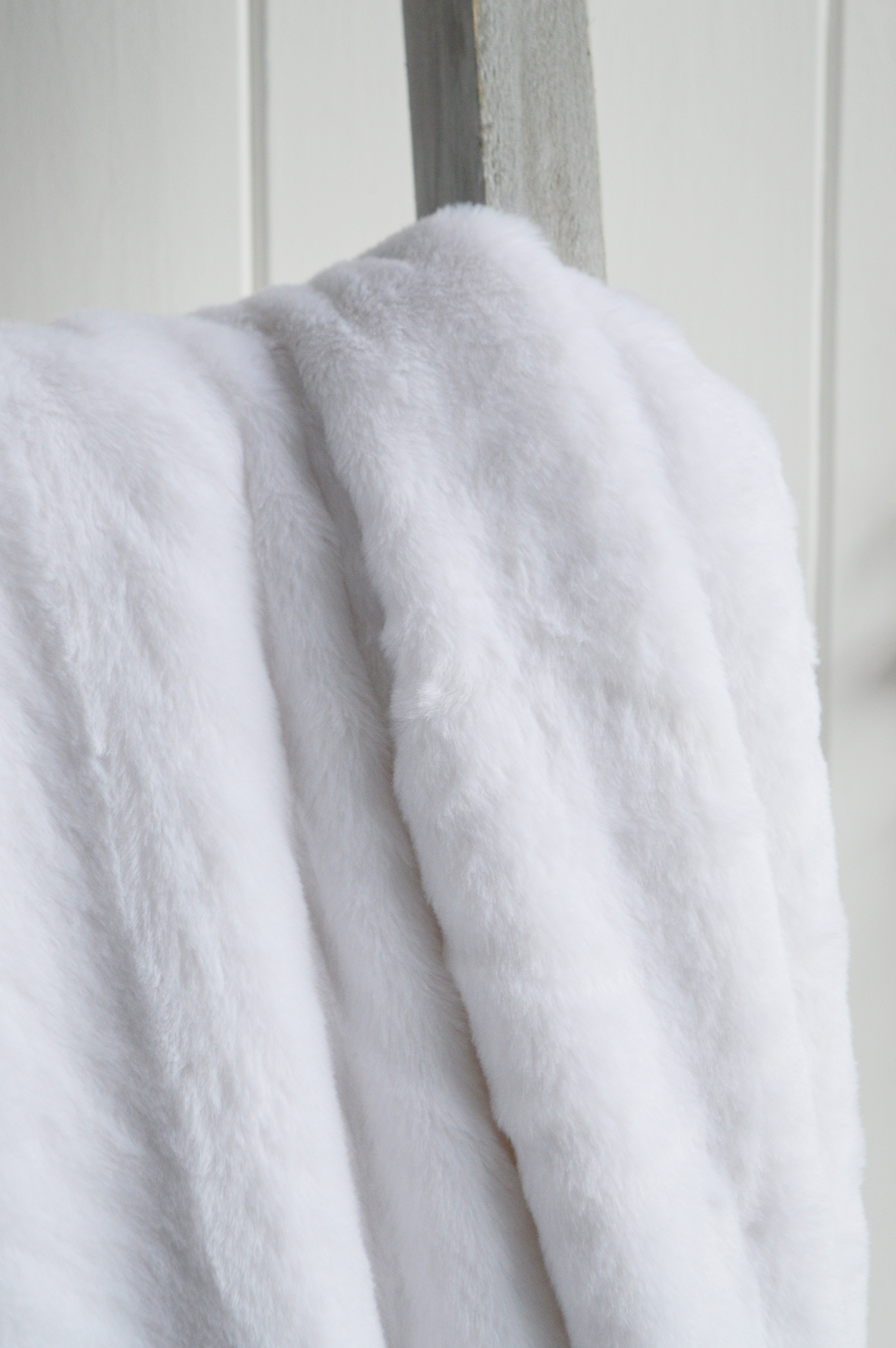 New England home interiors. Stowe cosy furry large throw from The White LIghthouse Furniture. Coastal, country, farmhouse and city home furnishings and furniture