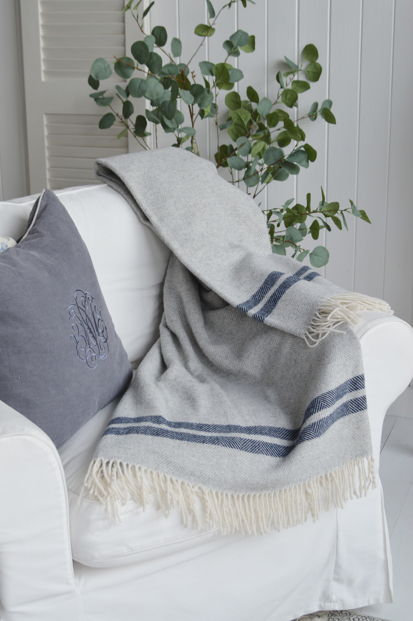 Sudbury wool grey and blue herringbone throw for subtle coastal interiors