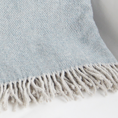 Sudbury teal herringbone wool throws from The White Lighthouse Furniture and Interiors for the Hallway, living room, bedroom and bathroom in New England styles country, coastal and city homes