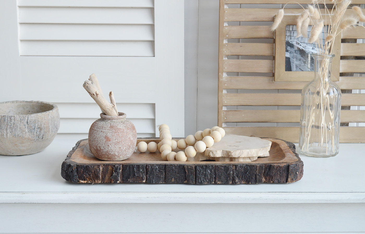 The White Lighthouse. White Furniture and accessories for the home. Natural wooden tree trunk trays for New England interiors for coastal, country, and modern farmhouse homes for coffee table and console table styling