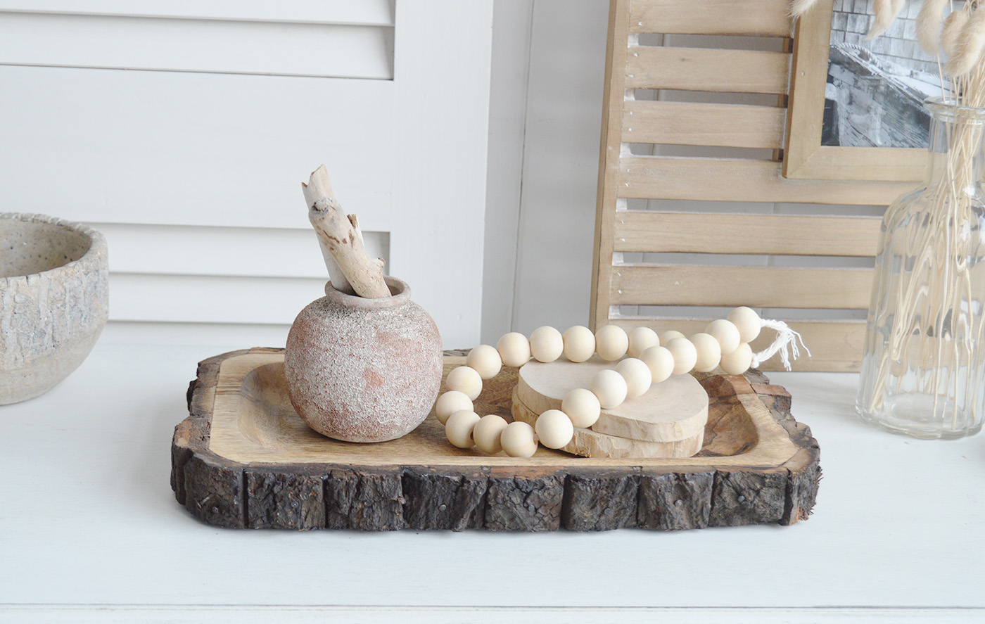 The White Lighthouse. White Furniture and accessories for the home. Natural wooden tree trunk trays for New England interiors for coastal, country, and modern farmhouse homes for coffee table and console table styling