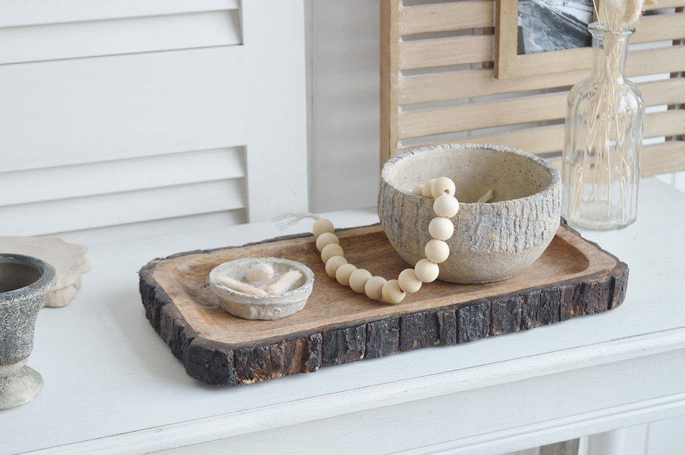 The White Lighthouse. White Furniture and accessories for the home. Natural wooden tree trunk trays for New England interiors for coastal, country, and modern farmhouse homes for coffee table and console table styling