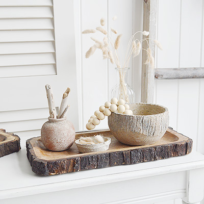 The White Lighthouse. White Furniture and accessories for the home. Natural wooden tree trunk trays for New England interiors for coastal, country, and modern farmhouse homes for coffee table and console table styling