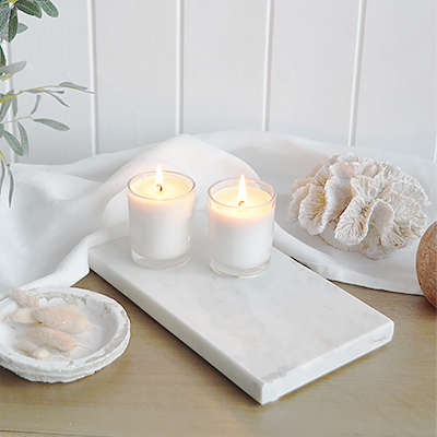 A white marble tray from The White Lighthouse furniture and accessories. New England style interiors for coastal, country, city and farmhouse styled homes