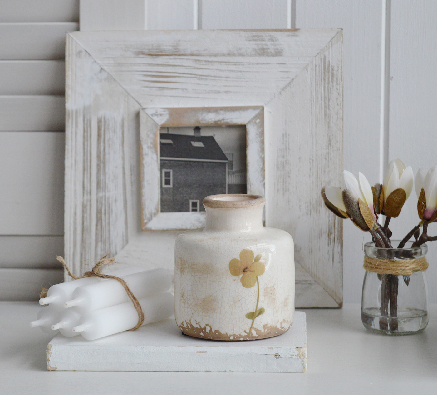 Close-up of Mable vase showing textured glaze and painted blossom