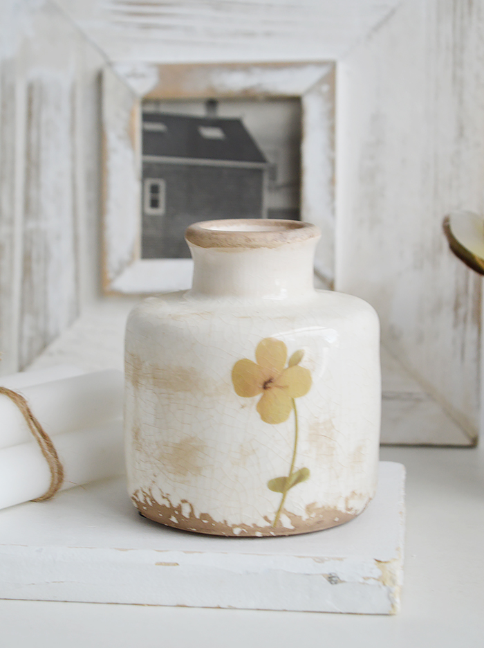 Mable ceramic vase styled in a light-filled New England coastal interior, featuring soft crackle glaze and hand-painted floral detail on a rustic wooden surface