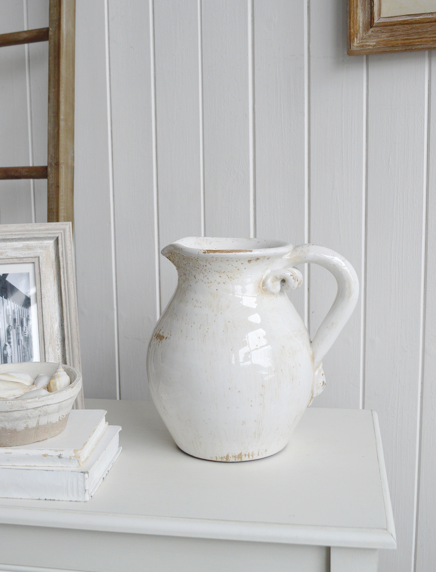 The Harvard White Jug adds rustic charm and character to coastal interiors with its timeless design.