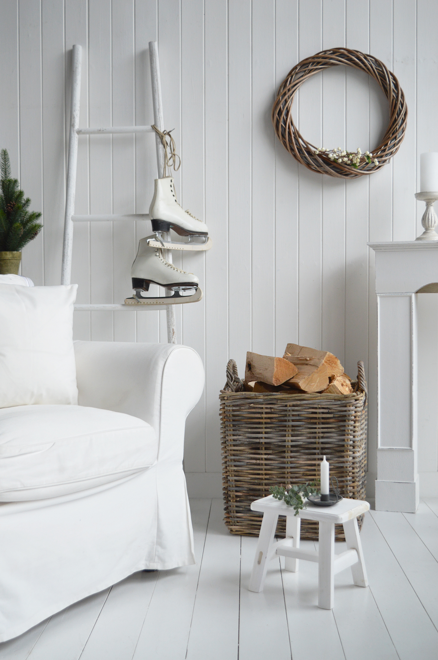 White home interiors with large Casco Bay log basket and white rustic Nantucker stool for modern farmhouse, country and coastal home interiors