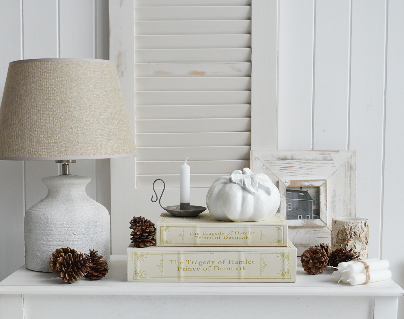 The Caswell set of 2 storage books shown with the white pumpkin for New England style Halloween, Fall and Autumn decor