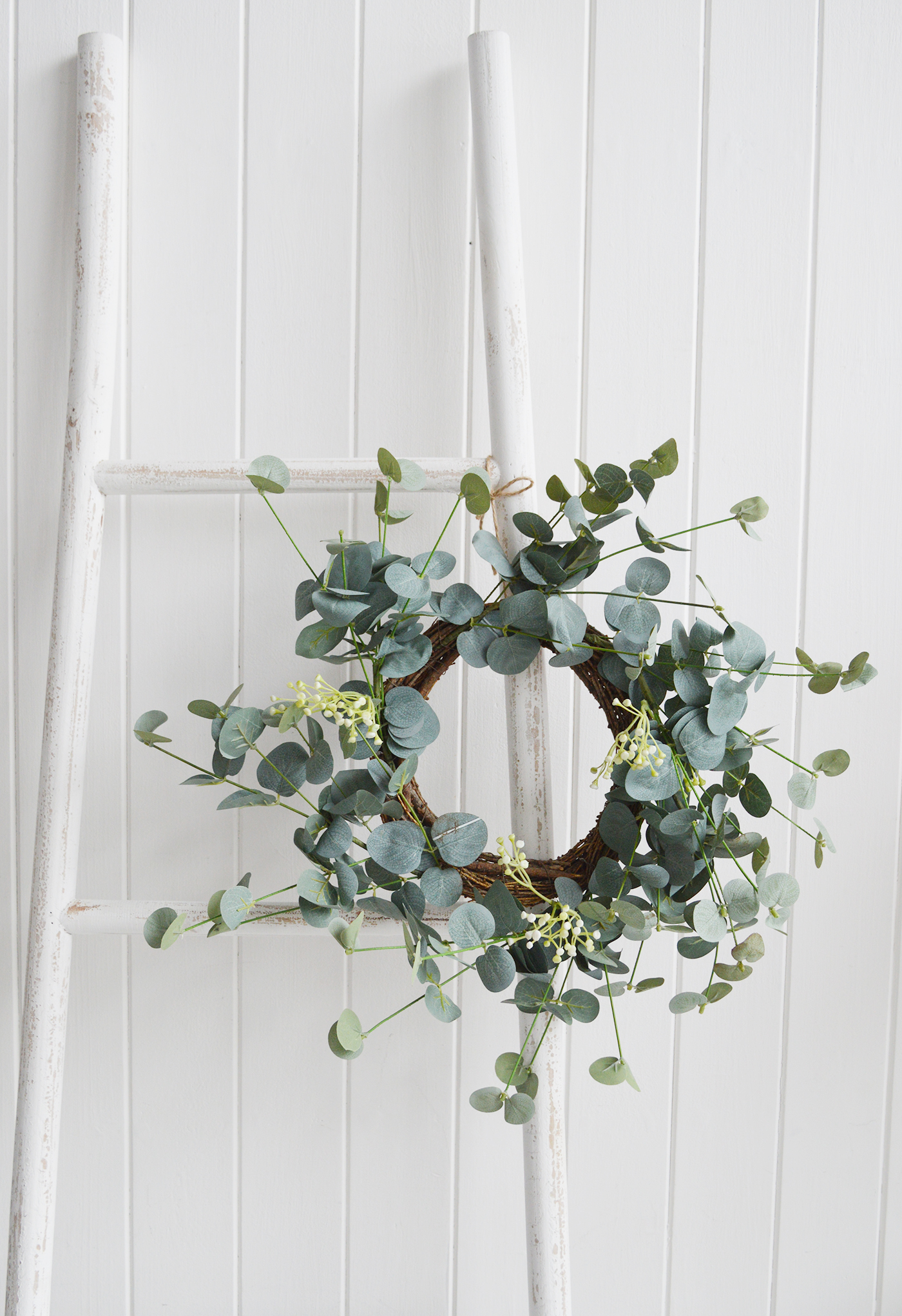 The White Lighthouse. White Furniture and accessories for the home. Artificial greenery Eucalyptus wreath to add greener to a New Enngland style country, coastal or modern farmhouse styled home 