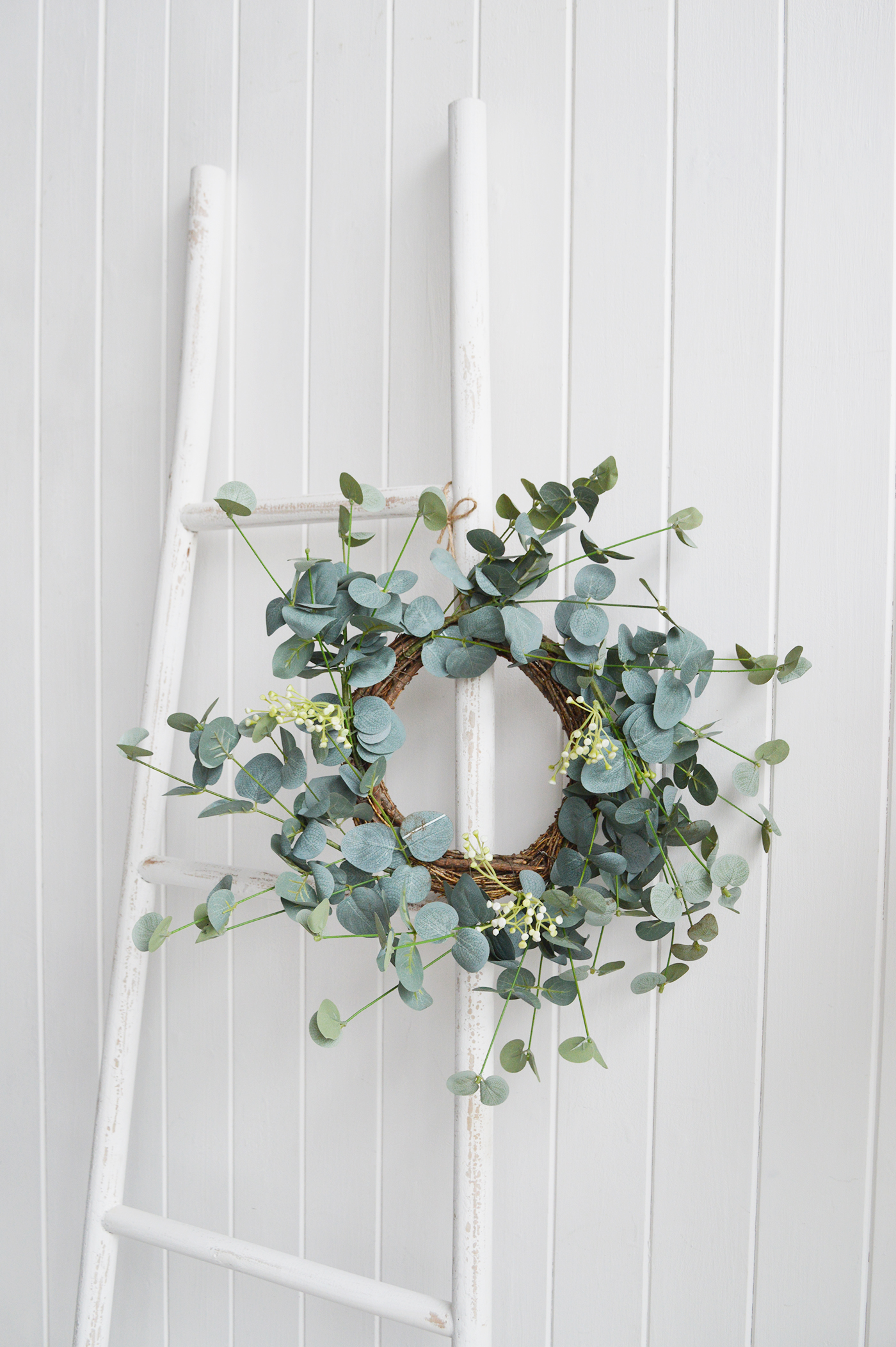 The White Lighthouse. White Furniture and accessories for the home. Artificial greenery Eucalyptus wreath to add greener to a New Enngland style country, coastal or modern farmhouse styled home 
