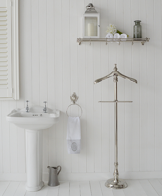 White bathroom with luxurious chrome bathroom accessories