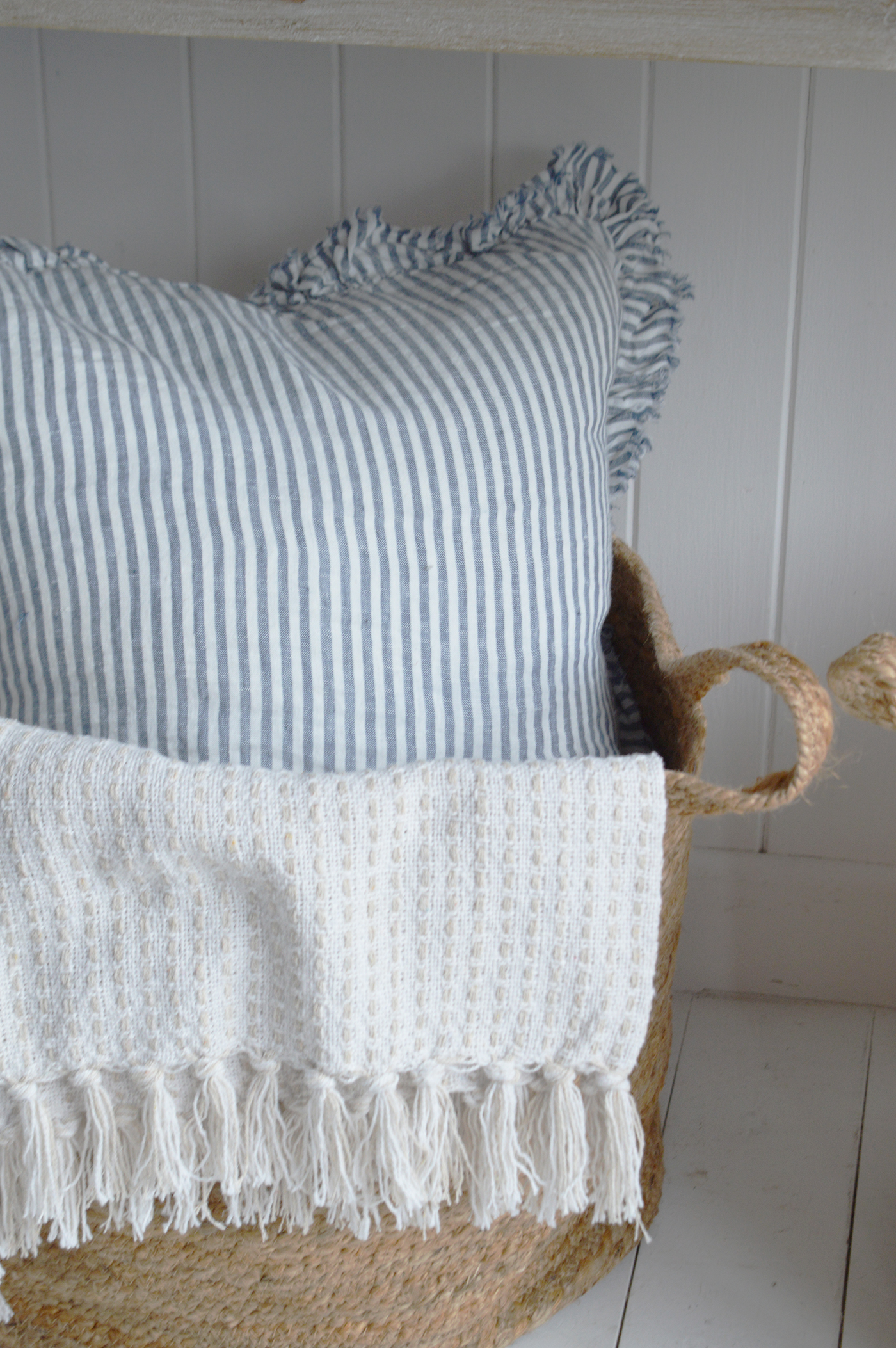 New England beach house styled with natural textures and fresh coastal colors.
